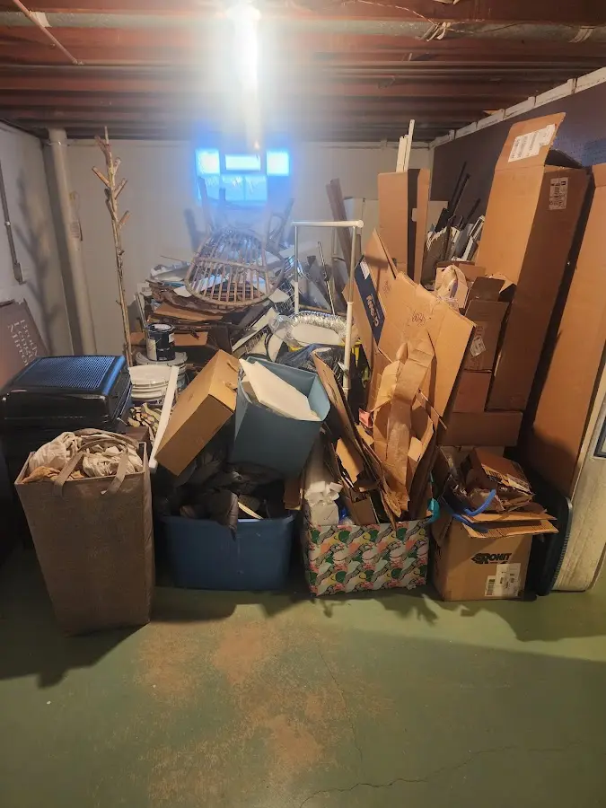 Roll-off dumpster container at job site for Construction Dumpster Rental in Brookhaven